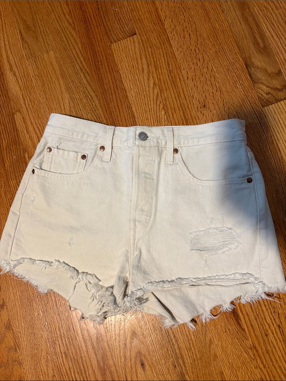 Levi’s 501 Off-White Distressed High-Waist Denim Shorts